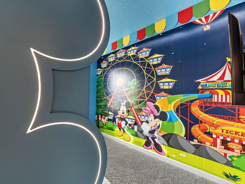A cheerful Mickey Mouse-themed room full of classic Disney fun.