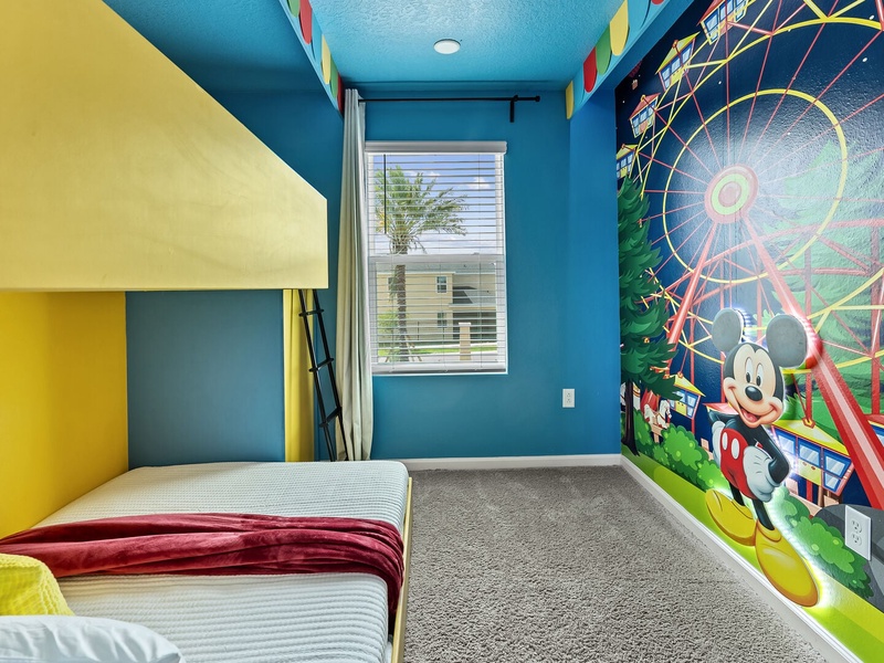 A cheerful Mickey Mouse-themed room full of classic Disney fun.