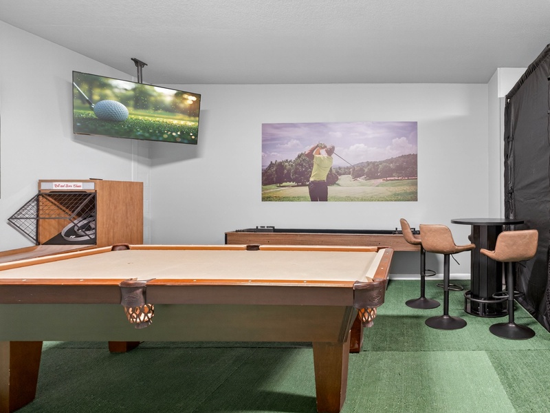 Our game room features a pool table, a shuffleboard table game and plenty of more entertainment.