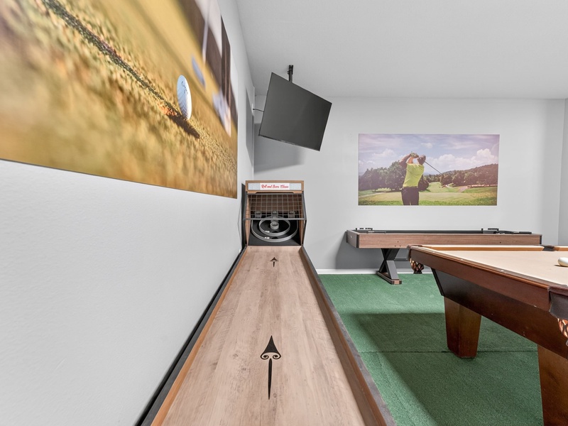 Test your precision and strategy on the shuffleboard table.