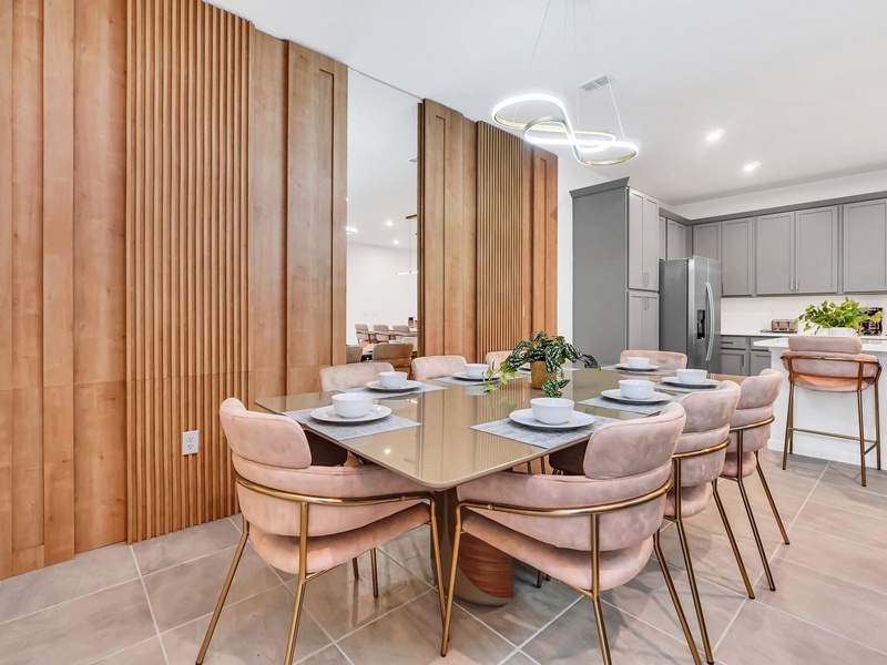 Gather for delicious meals and memorable moments in this beautifully designed dining space.