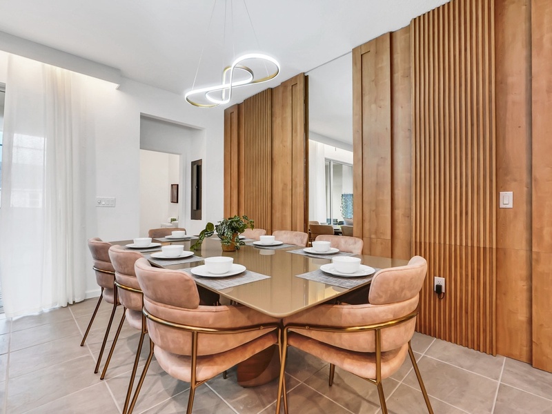 Gather for delicious meals and memorable moments in this beautifully designed dining space.
