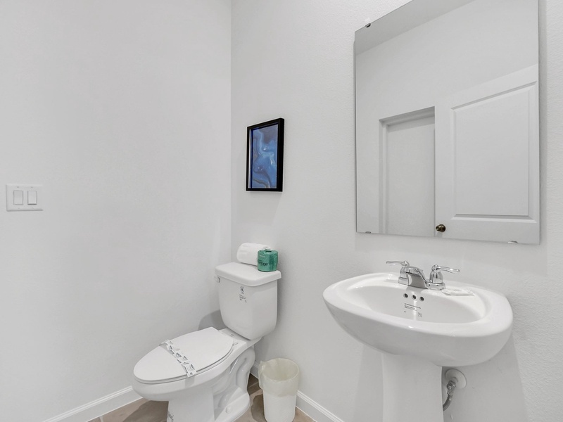 A stylish and convenient guest bathroom.