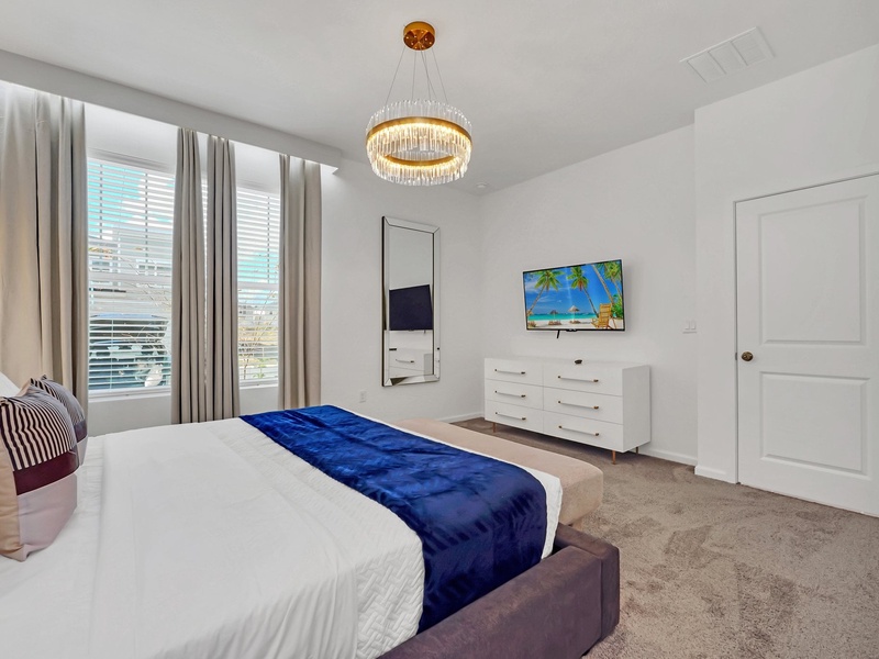 Each bedroom features its own TV, perfect for unwinding with your favorite shows after a fun-filled day exploring Orlando!