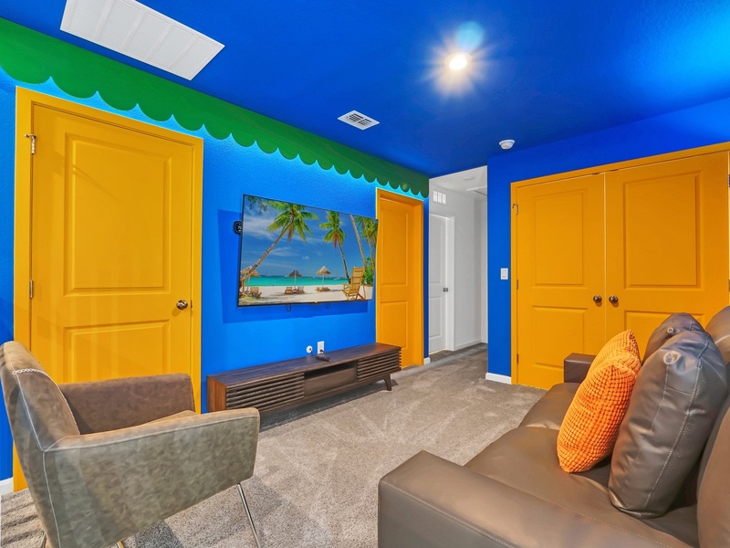 Race into fun in this colorful Mario Kart-inspired lounge with playful murals and comfy seating!