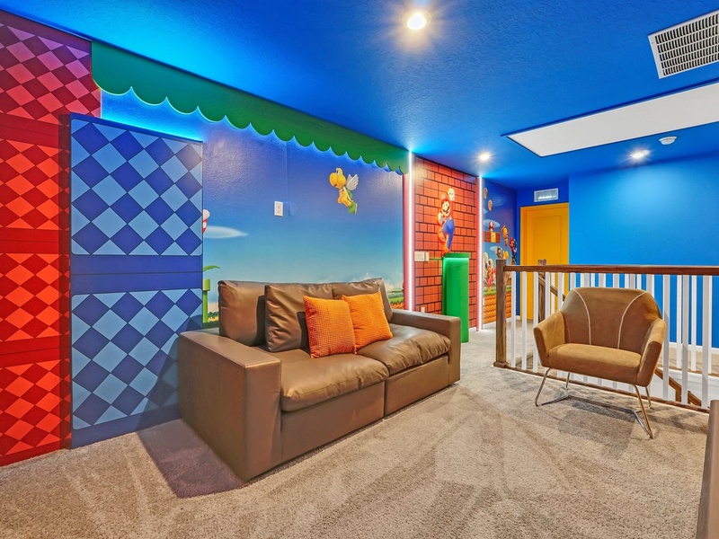Race into fun in this colorful Mario Kart-inspired lounge with playful murals and comfy seating!