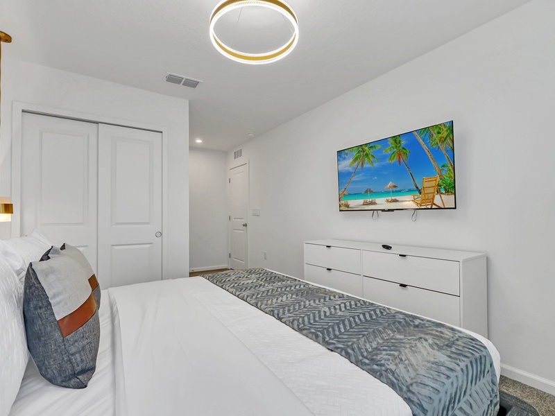 Each bedroom features its own TV, perfect for unwinding with your favorite shows after a fun-filled day exploring Orlando!