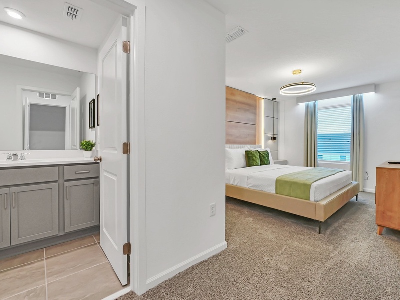Enjoy comfort and privacy in this modern ensuite bathroom.
