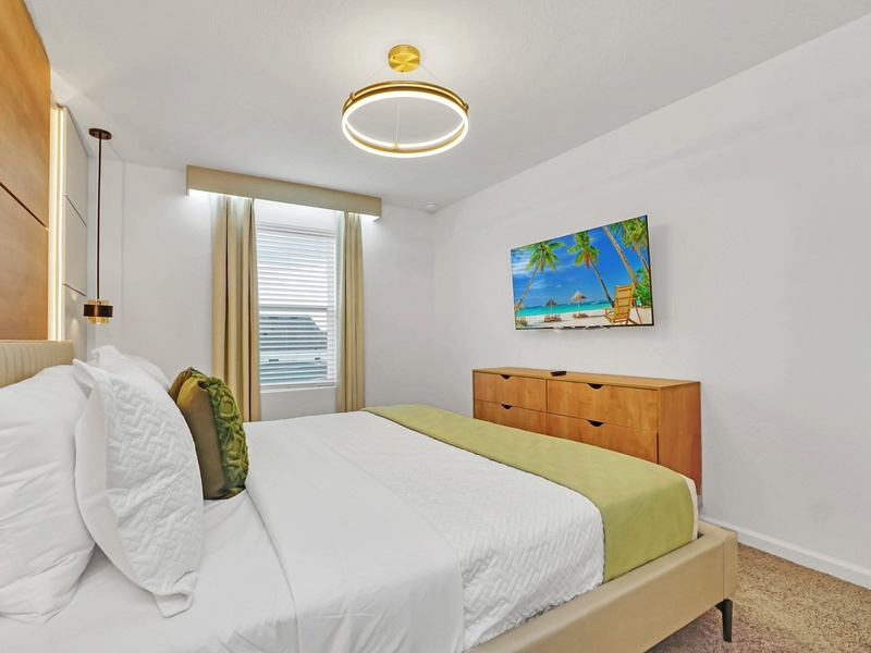 Each bedroom features its own TV, perfect for unwinding with your favorite shows after a fun-filled day exploring Orlando!