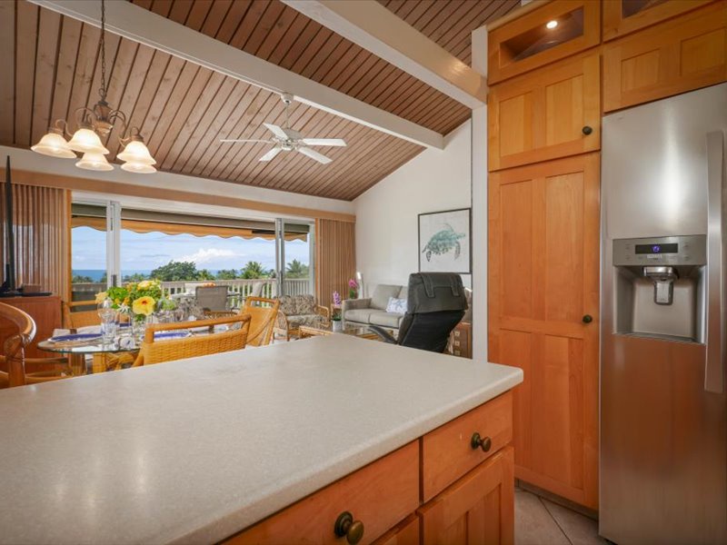This bright, open-concept space connects the kitchen, dining, and living areas for effortless island living