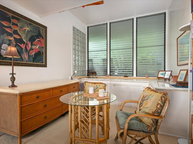 This versatile sitting area offers a peaceful spot for reading, writing, or enjoying your morning coffee