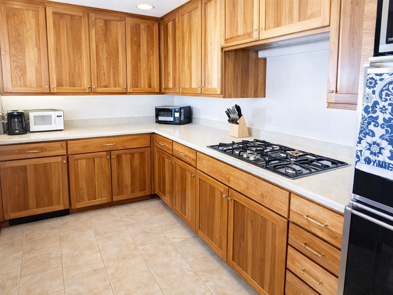 Bright, fully equipped kitchen with ocean views