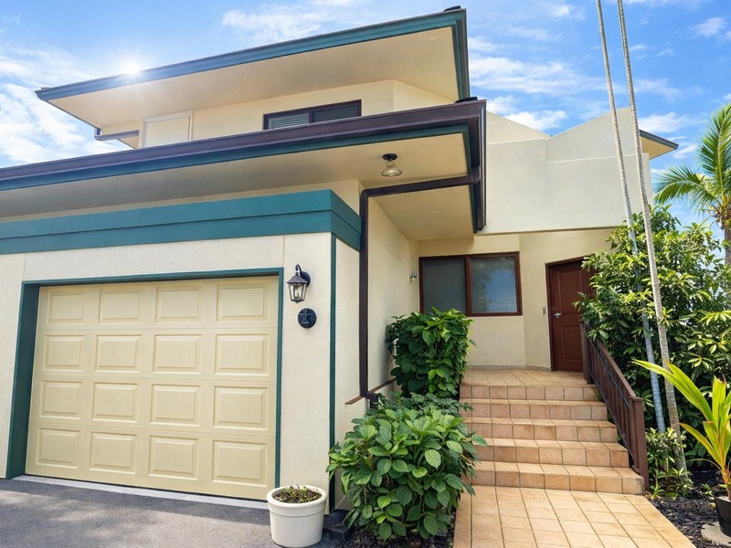 Inviting Island Entrance with Tropical Curb Appeal