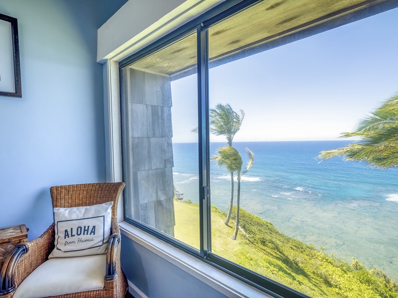 The small seating area by the window is great for taking some space, enjoying a quiet afternoon by yourself, and simply enjoying the beautiful tropical surroundings. 