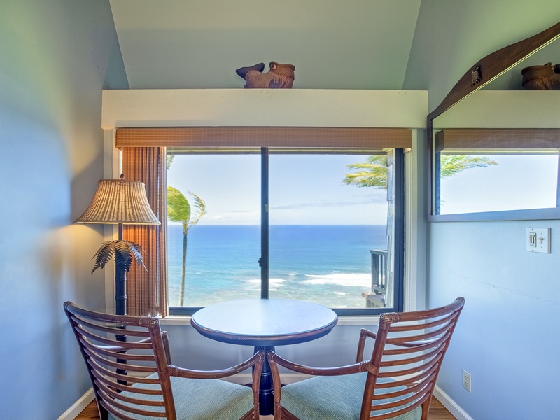 The inside seating area is the perfect spot for curling up with a book, watching the waves crash against the coast, and enjoying the tropical surroundings.