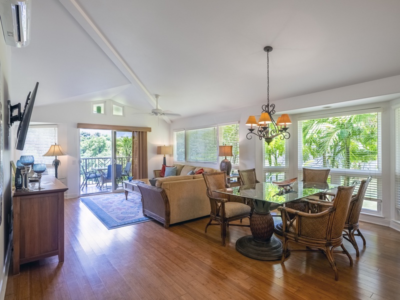 Out in the main living space you'll find floor to ceiling windows, a comfy den area, and a dining area that seats 6 - plenty of room for everyone!