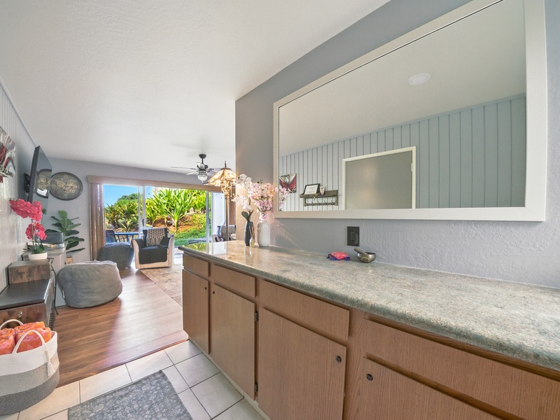 Right as you walk in, you'll be greeted by a cheerful, sunny space, and a basket of beach towels for you to make use of during your stay!