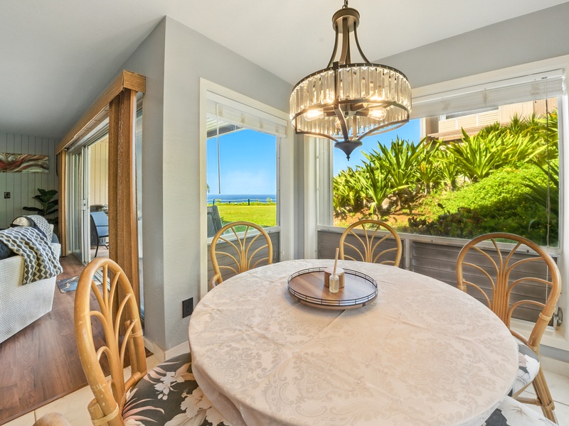 The cheerful, sun-soaked dining nook at Pali Ke Kua 132. You can sit down for a casual meal, and be treated to views of the Pacific at the same time!
