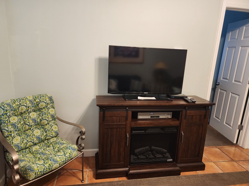 living room TV & door to bedroom