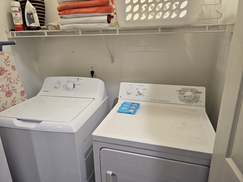 laundry room with doors open