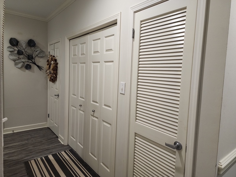 hallway showing laundry room area
