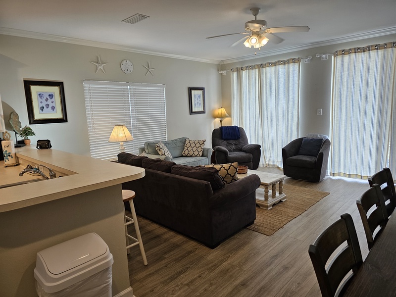 Living Room with open concept design to Kitchen and Dining area