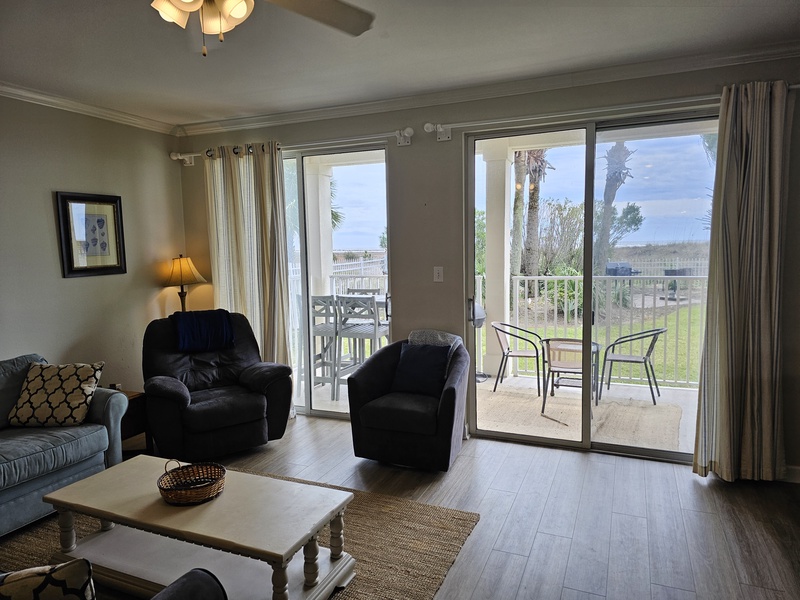 Living Room with view of Private Patio