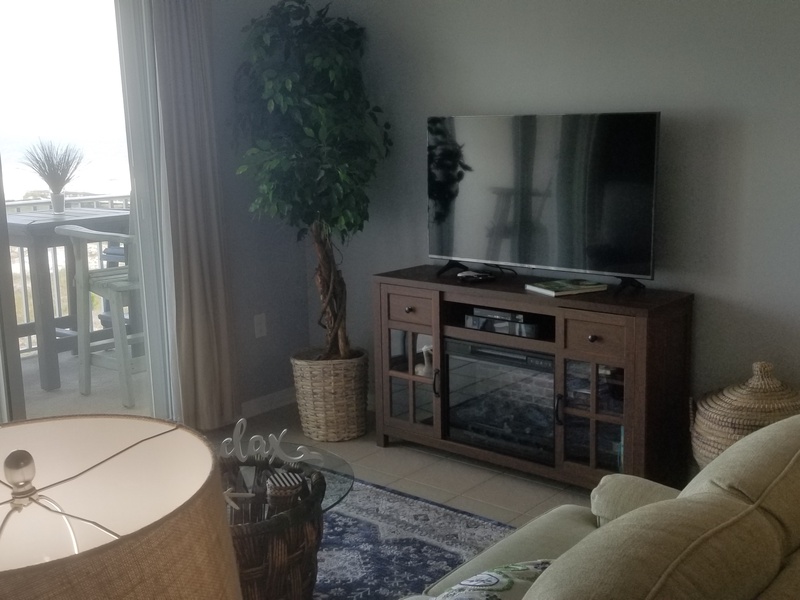 living room TV & balcony