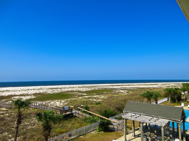 view of patio and ocean