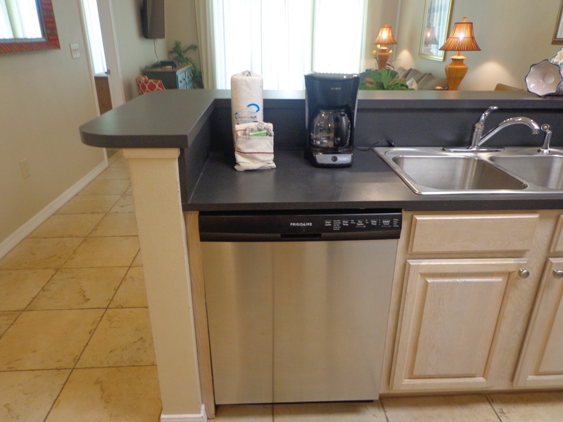 Full kitchen with coffee maker.