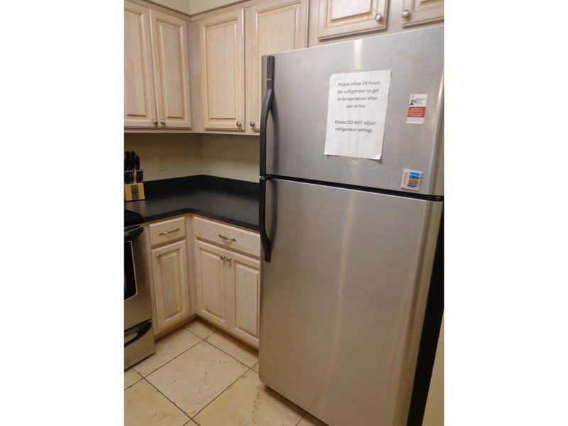 Full kitchen with coffee maker.
