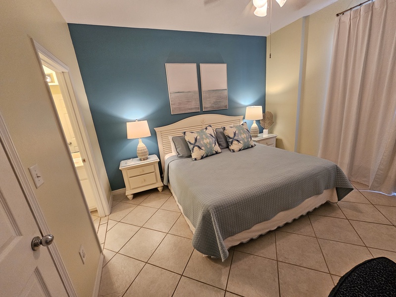 Master Bedroom with beautiful accent wall. 