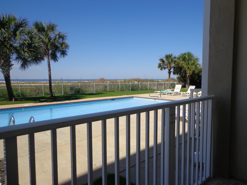 view of gate & pool