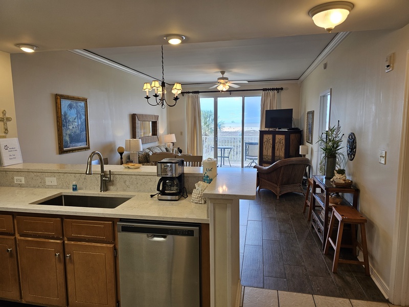 view of kitchen, dining area & living room