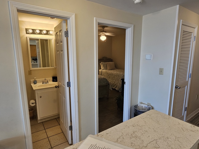 Bathroom accesses Living Area and Bedroom. 