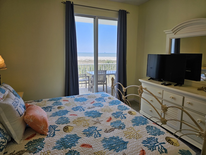 master bedroom TV & balcony access