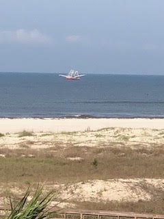 shrimp boat off the shore