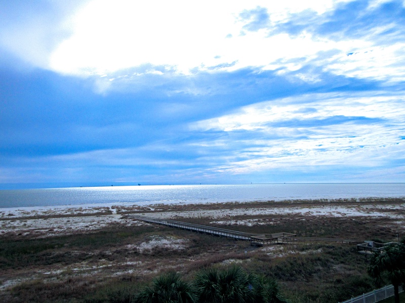 view of boardwalk & ocean