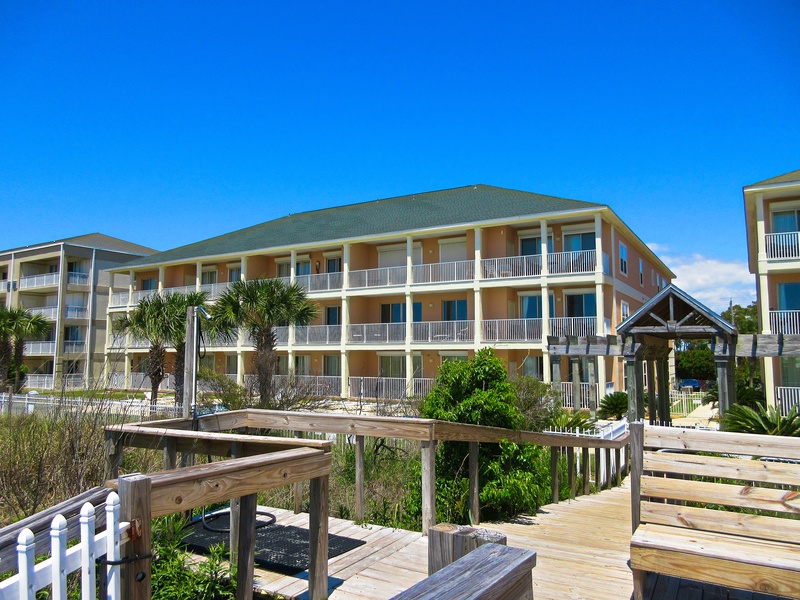 Exterior of Condo Complex featuring Boardwalk