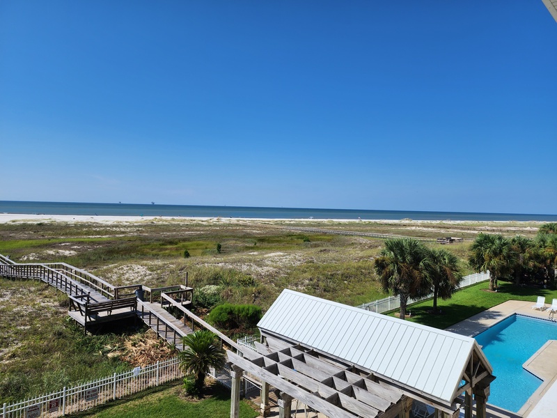 View of beach and outdoor patio