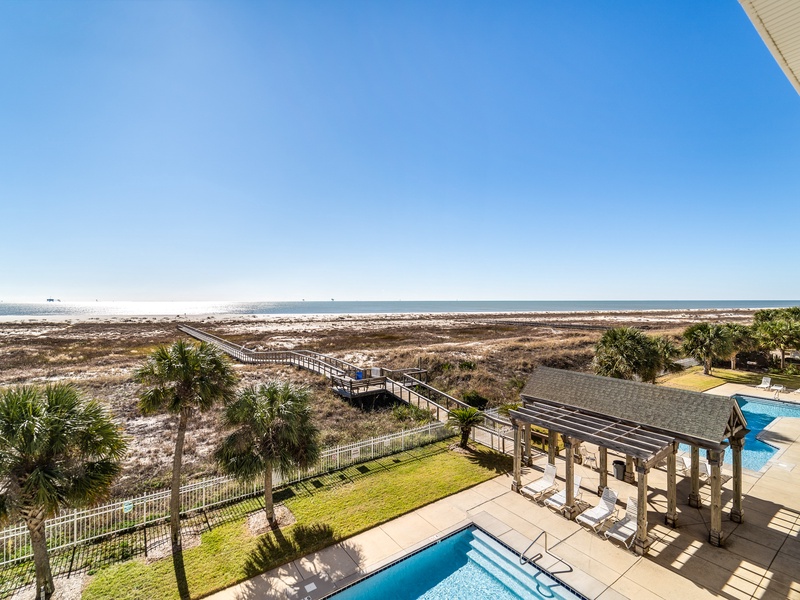 View of pools & outdoor patio