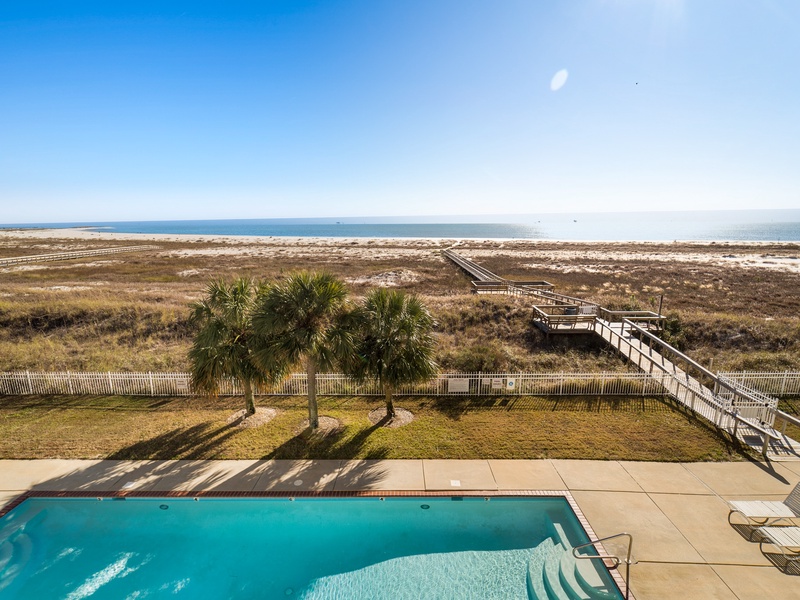 view of pool from balcony