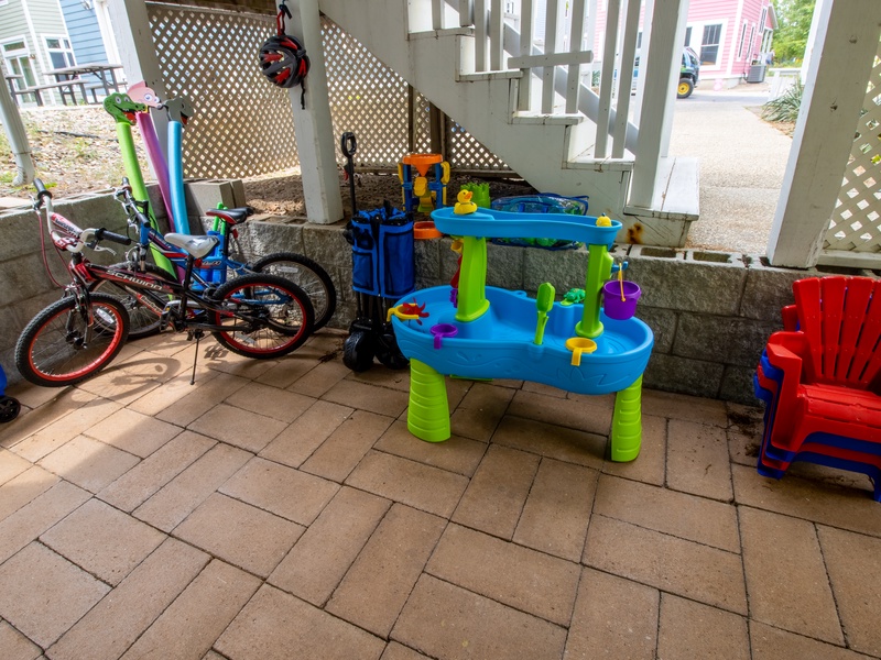 Outside Living | Side Patio with Summer Toys