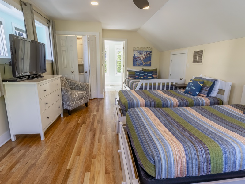 Second Level | Bedroom 2 | 1 Queen | 3 Twin | Attached 3/4 Bath