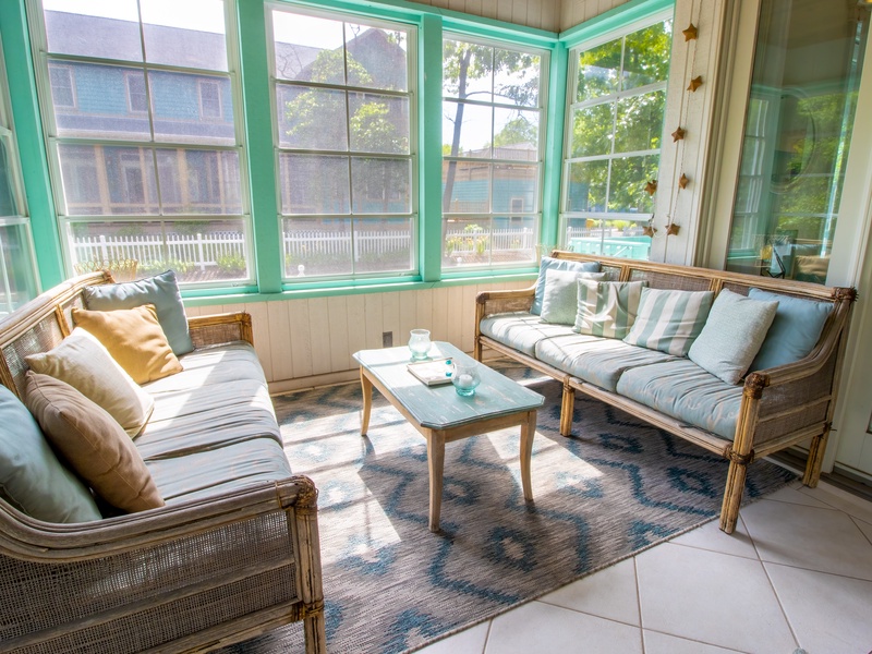 Main level 4 seasons porch with fireplace
