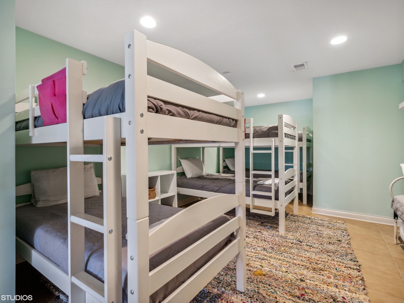 Garden Level | Bedroom 4 | Three Bunk Beds, Daybed with Trundle
