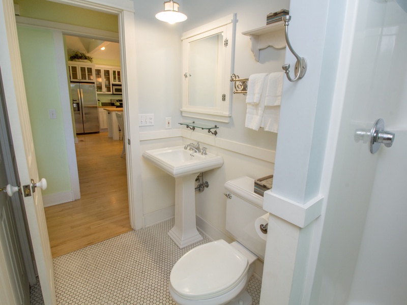 Main Level | Bath 1 | Standalone Full Bath with Outdoor Access