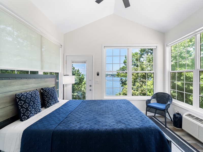 Queen bed in sunroom off bedroom 1