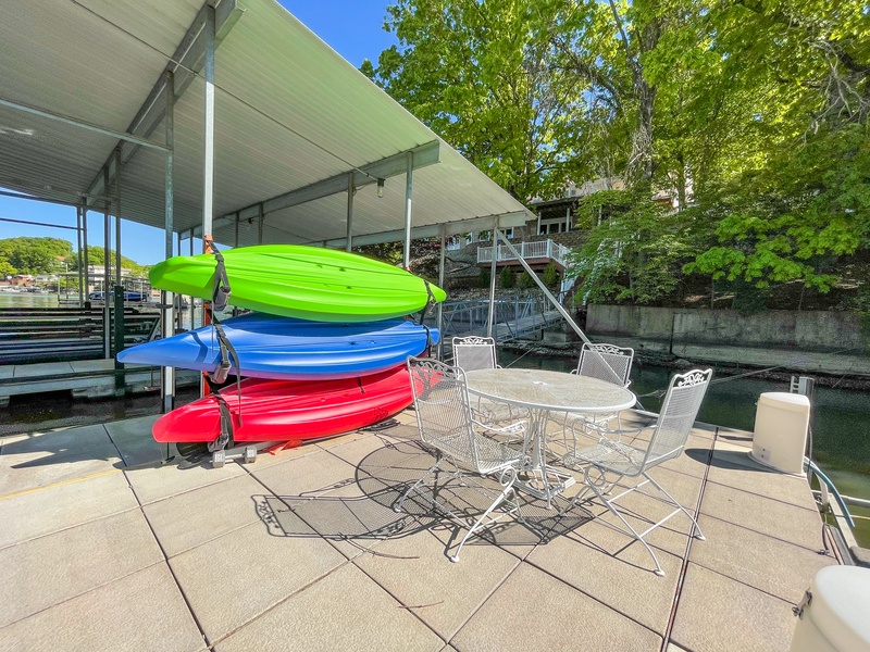 The dock with swim platform and kayaks