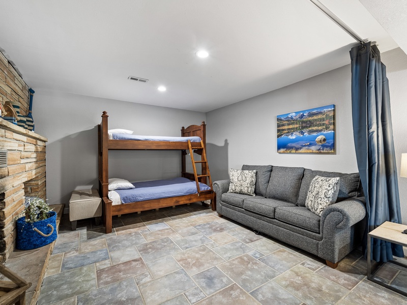 Twin over full bunk bed and pullout sofa on lower level